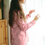 Camicia a righe rosse e bianche