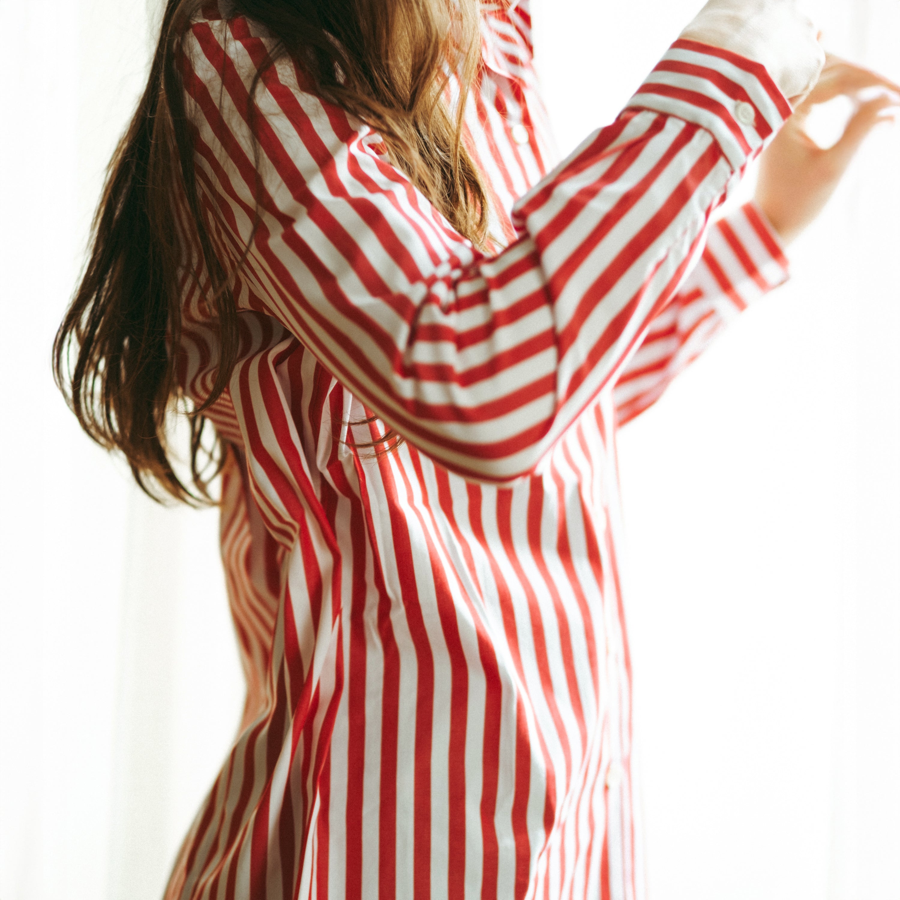 Camicia a righe rosse e bianche