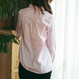 Camicia a righe rosa e bianche